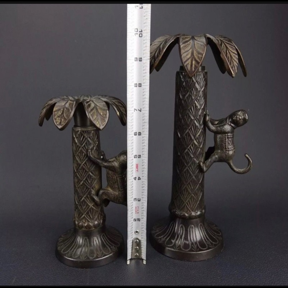 Vintage Bombay palm and monkey brass candlesticks